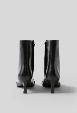Bottines cuir boucle dorée