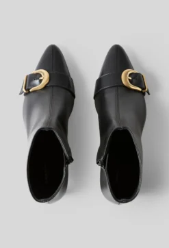 Bottines cuir boucle dorée