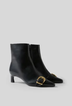 Bottines cuir boucle dorée