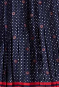 Jupe courte plissée satin