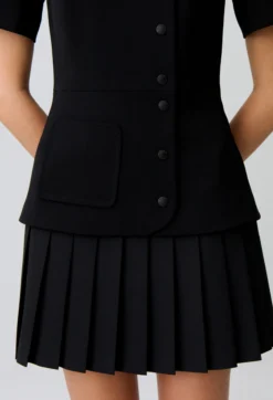 Robe courte bas plissé effet basque