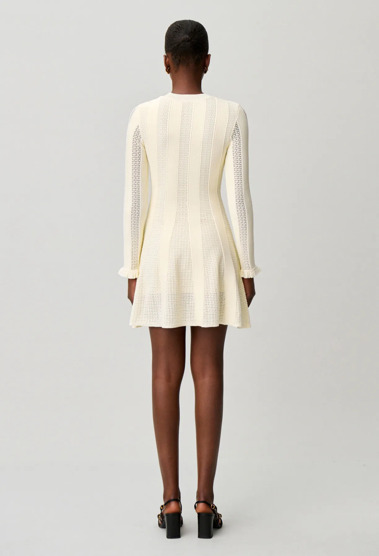 Robe courte maille patineuse