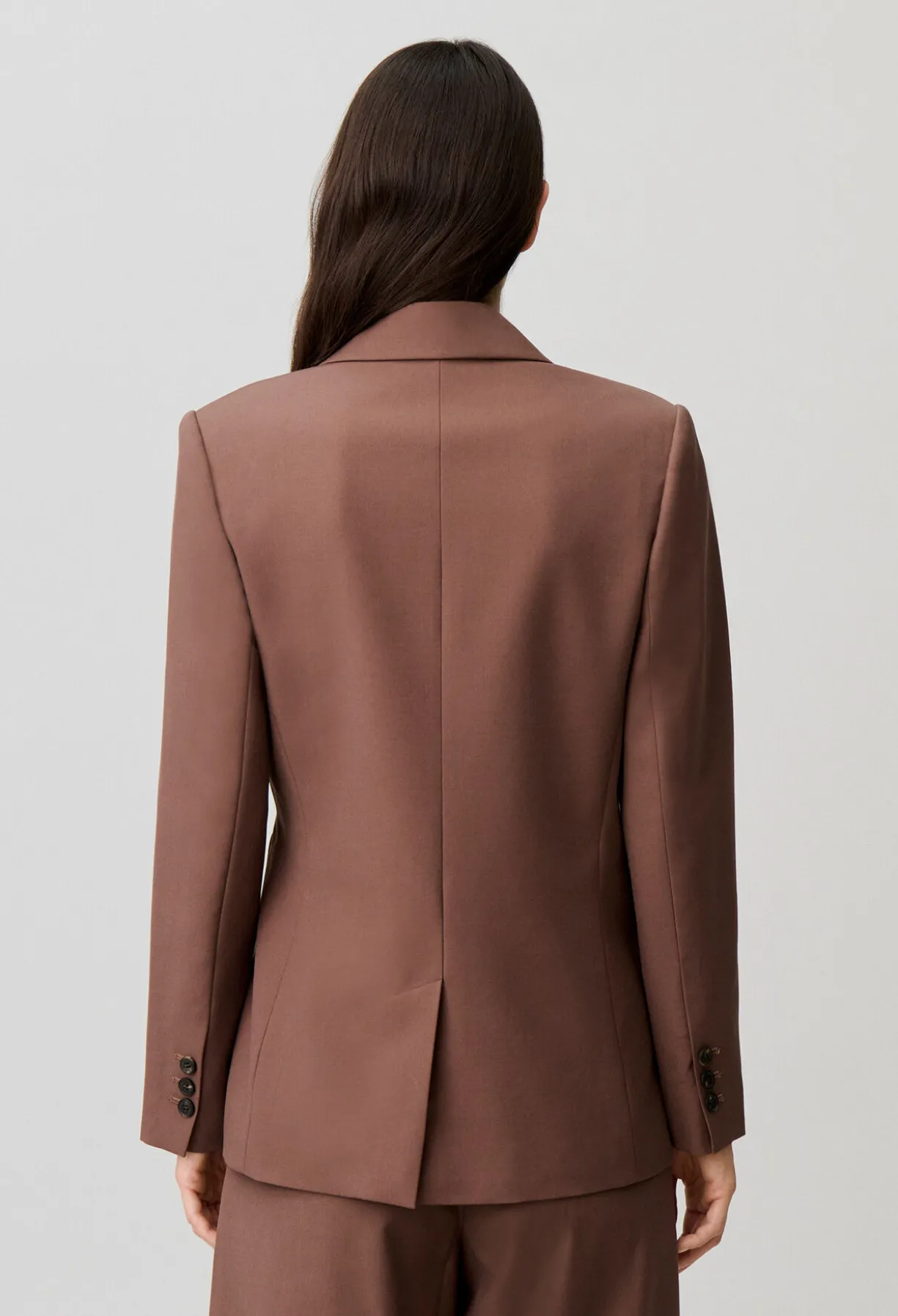 Veste droite double boucle argentée