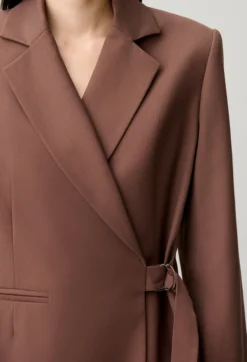Veste droite double boucle argentée